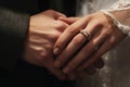 A close-up view of two people tightly holding hands, depicting a strong, intimate connection between them, Close-up of two hands