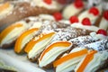 Close up view of typical sicilian cannoli pastry stuffed with ricotta