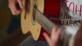 Close up of unknown hands playing indoors. Unrecognizable musician playing.