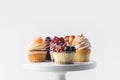 Close up view of various sweet cupcakes on cake stand Royalty Free Stock Photo