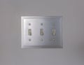 Close up view of vertical flip toggle light switches in off mode