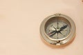 Close-up view of vintage brass compass Royalty Free Stock Photo