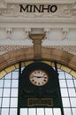 Close-up view of vintage clock in the railway station in Porto, Portugal. station clock in Sao Bento Train Station Royalty Free Stock Photo