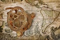 Close-up view of a vintage compass on an old retro map Royalty Free Stock Photo