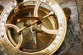 Close-up view of a vintage compass on an old retro map Royalty Free Stock Photo