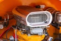 Vintage muscle car engine in side the hood