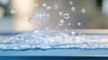 Close-up View of Water Electrolysis Showing Bubbles Forming on Electrodes in a Blue-Lit Container Royalty Free Stock Photo