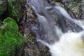 Close-up view of water fall. Beautiful deep forest waterfall. Royalty Free Stock Photo
