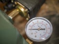 Close-up view of Water pump pressure gauge