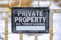 Close up view of a weathered sign that reads Private Property No Trespassing Royalty Free Stock Photo