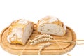 Close up view of white loaf wheat bread on wooden cutting broad on white background Royalty Free Stock Photo