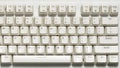 Close-up of mechanical computer keyboard with white keycaps and clean minimal design Royalty Free Stock Photo