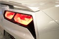 Close-up view of white sports car rear light Royalty Free Stock Photo