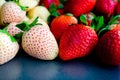 Close-up View of Whole Pineberries and Strawberries Royalty Free Stock Photo