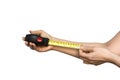 Close up view of woman hand holding Tape measure. Royalty Free Stock Photo