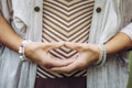 Close up view of woman hands doing meditation Dhyana mudra gesture also known as Samadhi mudra. Royalty Free Stock Photo