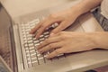 Close up view of woman hands keyboarding on laptop. Royalty Free Stock Photo