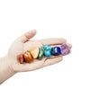 Close up view of woman healer hand showing all seven chakra color crystal stones in color order. Royalty Free Stock Photo