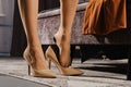 Close-up view of a woman putting on a shoe Royalty Free Stock Photo