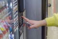 hand pushing button of vending coffee machine Royalty Free Stock Photo