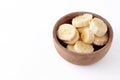 Close up view of wooden bowl with banana slices Royalty Free Stock Photo
