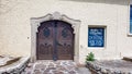 Duernstein - Close up view of wooden entrance door to wine tasting shop in Duernstein in Krems an der Donau Royalty Free Stock Photo