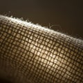 Close-up view of a woven burlap texture, highlighting an intricate lattice pattern. The Royalty Free Stock Photo