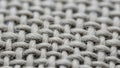 Woven fabric showcasing a textured pattern of interlacing gray Royalty Free Stock Photo