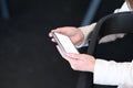 Close up view of female hands holding mock up smart phone with white screen. Royalty Free Stock Photo