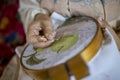 Woman embroider something traditional