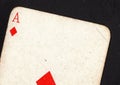 Close up of a vintage ace of diamonds playing card on a black background. Royalty Free Stock Photo