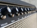 Close-up vintage amplifier combo with black knob and control panel. clean and low-gain distortion. Royalty Free Stock Photo