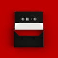 Close up of vintage audio tape cassette with cassette tape box concept illustration on red background Royalty Free Stock Photo