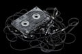 Close up of vintage audio tape cassette, isolated on black, with
