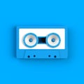 Close up of vintage audio tape cassette with speakers concept illustration on blue background Royalty Free Stock Photo