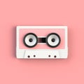 Close up of vintage audio tape cassette with speakers concept illustration on pink background Royalty Free Stock Photo