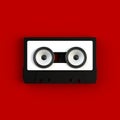 Close up of vintage audio tape cassette with speakers concept illustration on red background Royalty Free Stock Photo