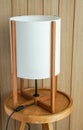 Vintage bedside lamp in hotel bedroom for lighting