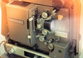 Old vintage rolling film cinema projector with copy space for background. Royalty Free Stock Photo