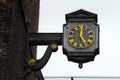 Close up vintage clock in street of London, England showing 5 o` Royalty Free Stock Photo