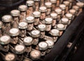 Close up of vintage fashioned typewriting machine.