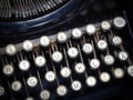 Close up of vintage fashioned typewriting machine.