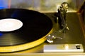 Close up at vintage gramophone. playing old song,Vintage record player with vinyl disc. Royalty Free Stock Photo