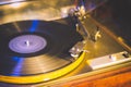 Close up at vintage gramophone. playing old song,Vintage record player with vinyl disc. Royalty Free Stock Photo