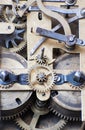 Close up vintage hand made clock interior mechanics. Gearwheels.