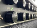 Close-up vintage head power amplifier with black knob and control panel. clean and hi-gain distortion. Royalty Free Stock Photo