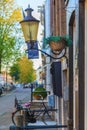 Close up vintage lamp with Amsterdam cityscape background