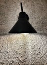 close up of vintage lamp on white rustic wall Royalty Free Stock Photo