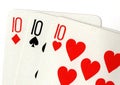 Close up of vintage playing cards showing three tens. Royalty Free Stock Photo