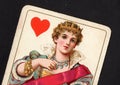 Close up of a vintage queen of hearts playing card. Royalty Free Stock Photo